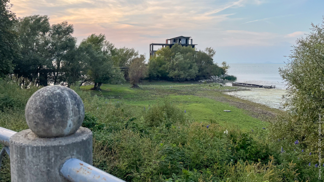 There's an abandoned restaurant on a small island in Lake Skadar. There are also the remains of an old sunken boat nearby.